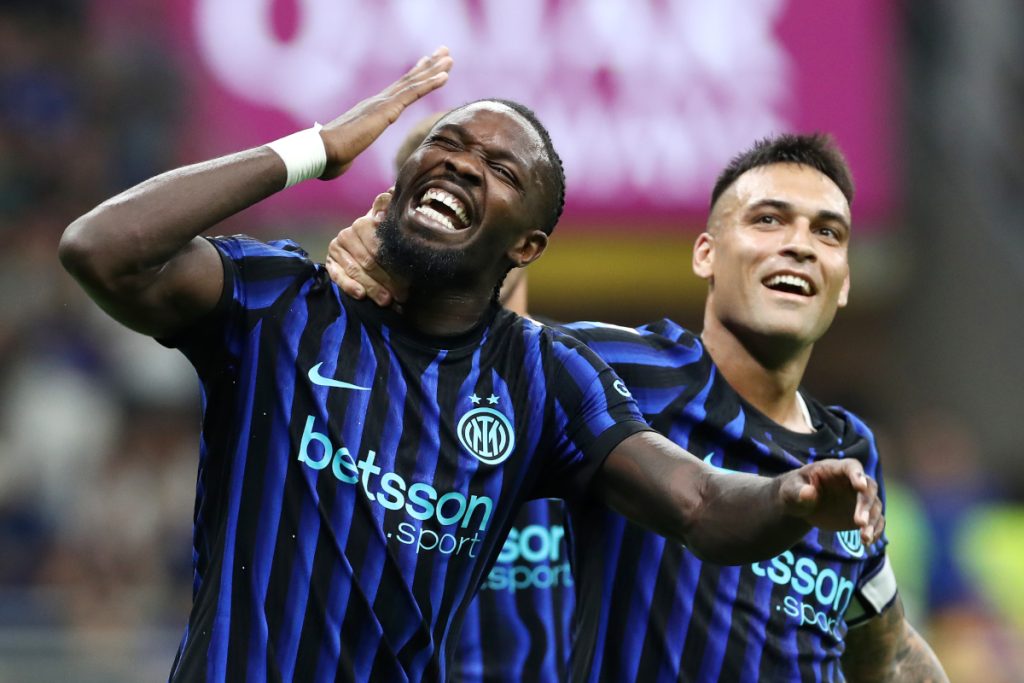 MILAN, ITALY - AUGUST 25: Lautaro Martinez and Marcus Thuram of Internazionale celebrates scoring his team
