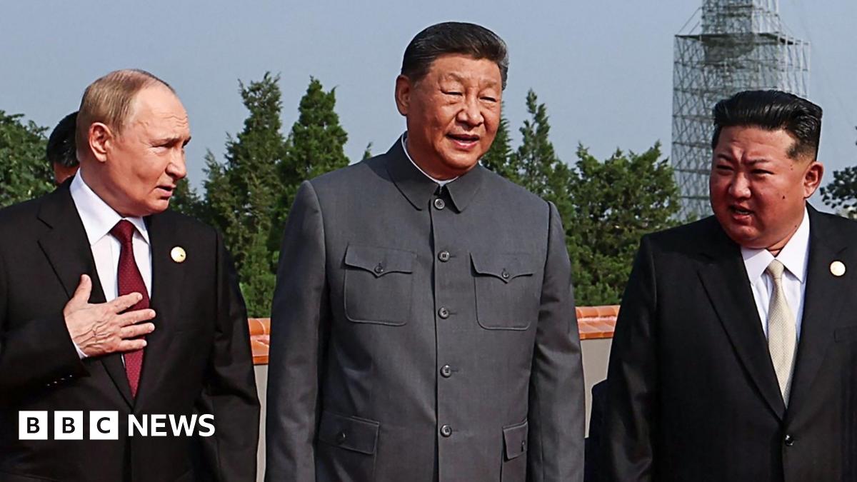 Putin and Kim join Xi in show of strength as China unveils new weapons at huge military parade