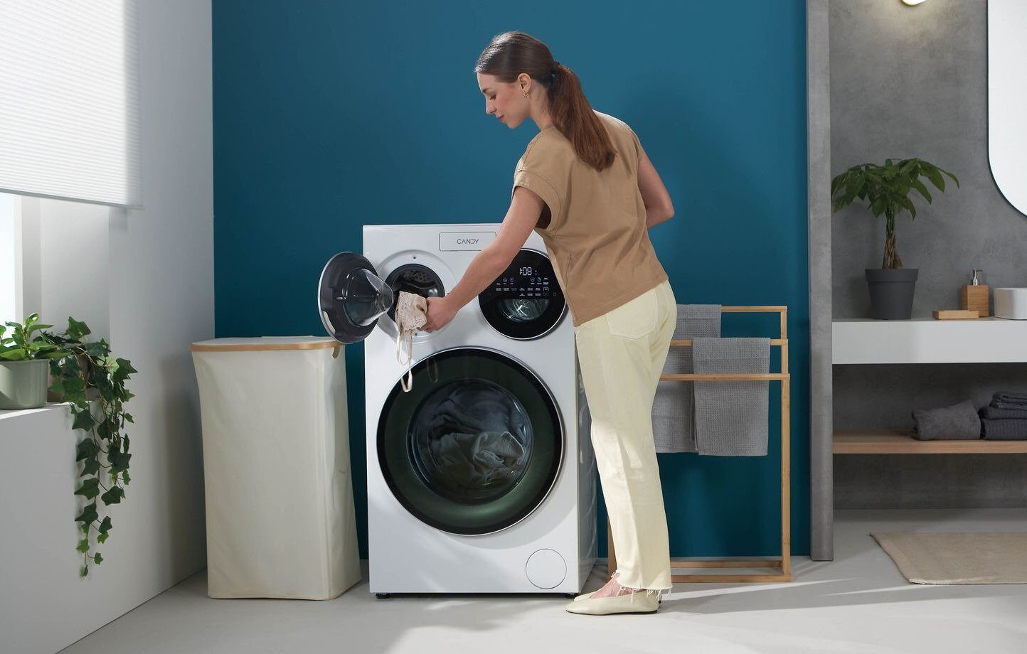 Candy Multi Wash: Mașina care spală simultan rufe albe, negre și colorate. Cum funcționează?