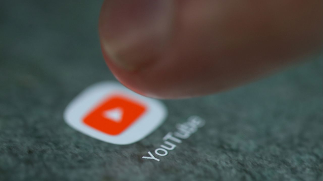 The YouTube app logo is seen on a smartphone in this picture illustration taken September 15, 2017. REUTERS/Dado Ruvic/Illustration