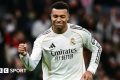 Kylian Mbappe celebrates scoring from the penalty spot for Real Madrid against Sevilla