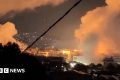 Israel and Hezbollah in Lebanon exchange fire as conflict widens after attack on Iran