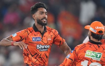 Who is Praful Hinge, who started his IPL career with a triple-wicket over?