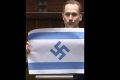 Deputat de extremă arată steag israelian cu svastică în parlamentul polonez