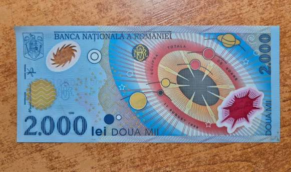 Bancnota de 2.000 de lei cu eclipsa: Cât valorează azi pentru colecționari